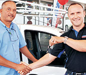 Jacques Lakey (l) receives the keys to his new bakkie from Regal branch operations director, Allen Beukes.